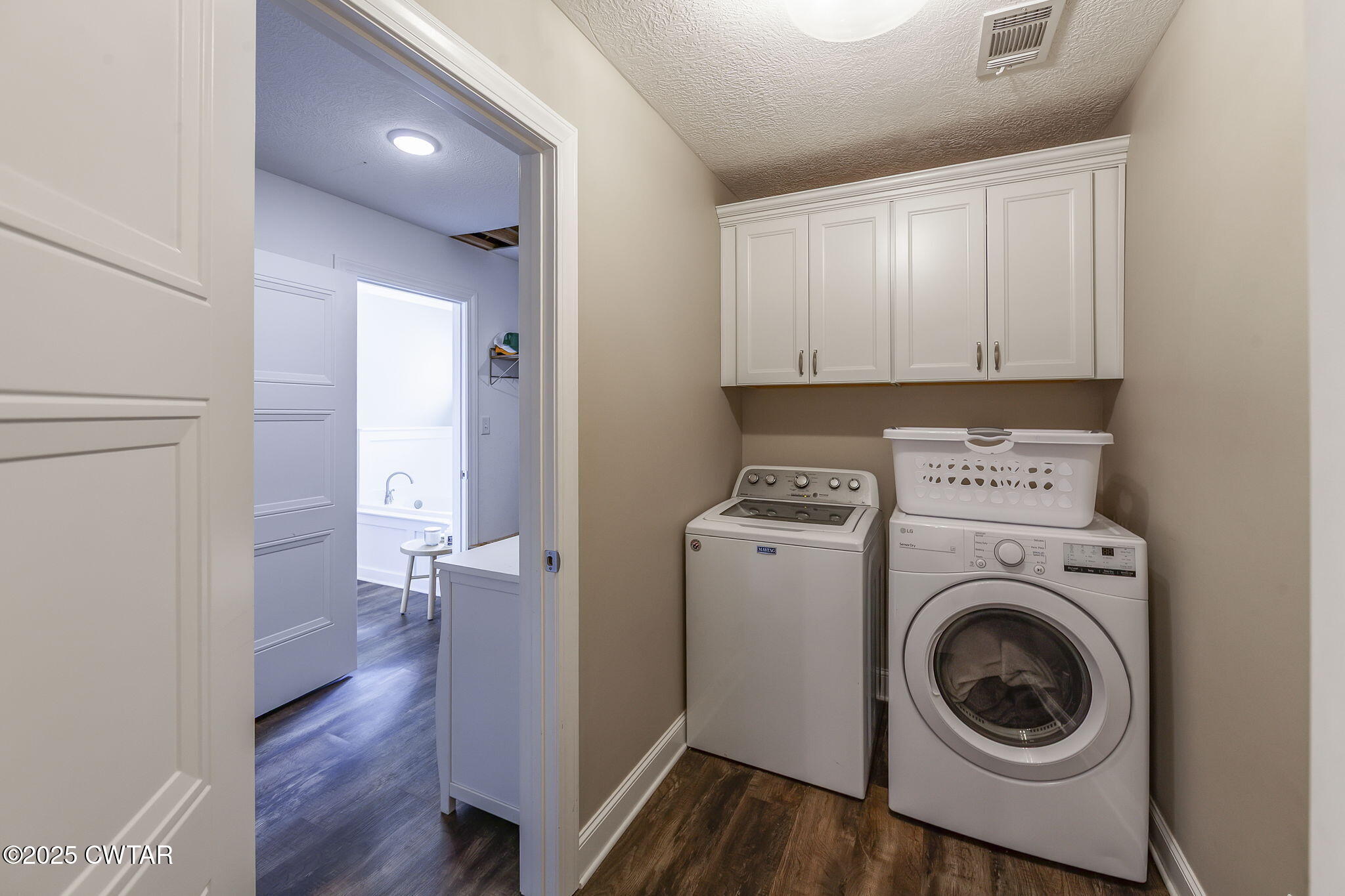 105 Fawn Ridge Lane Medina, TN 38355 - Photo 19 of 40 a view of a storage and utility room with washer and dryer