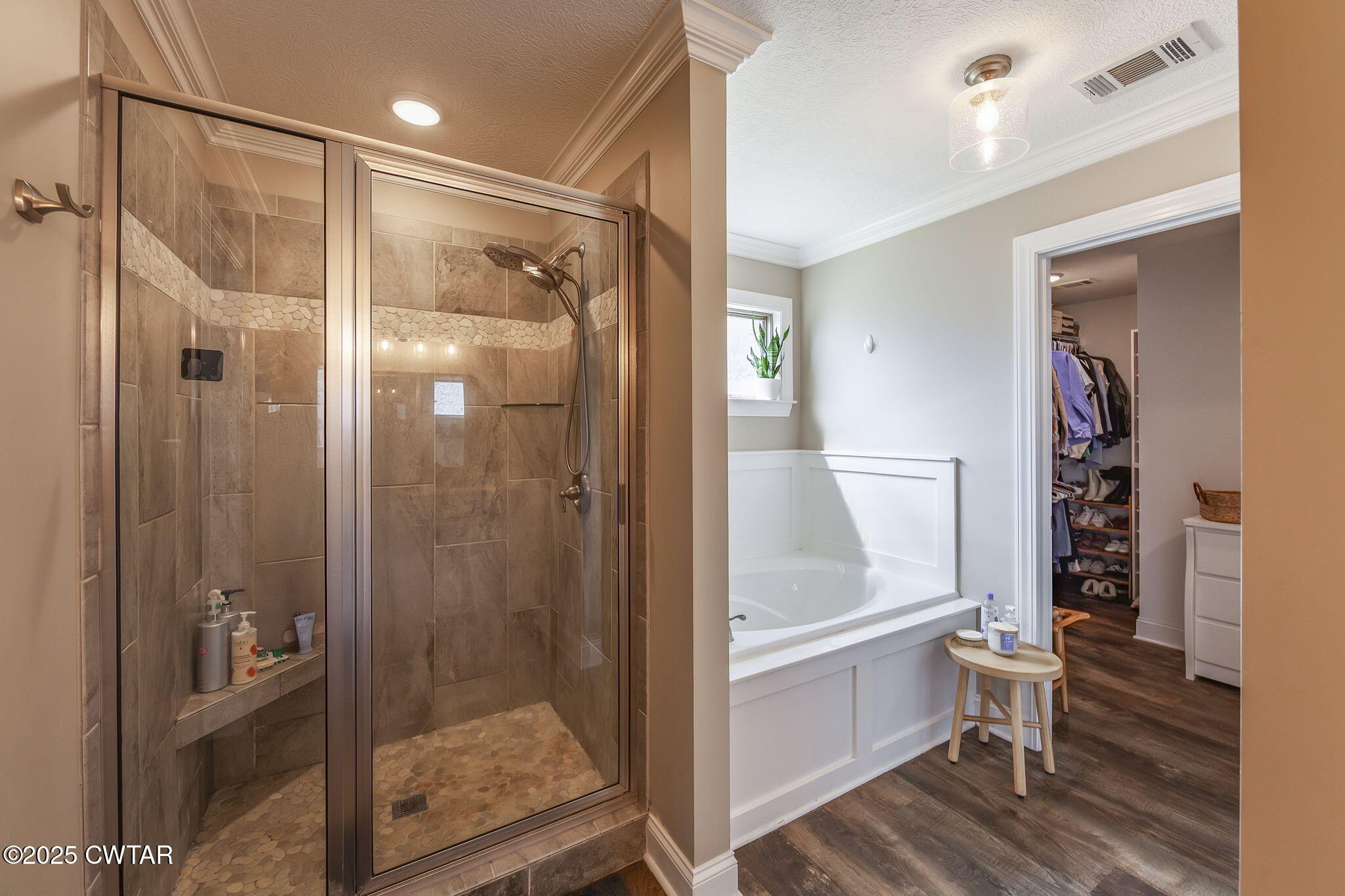 105 Fawn Ridge Lane Medina, TN 38355 - Photo 23 of 40 a bathroom with a glass shower door and a toilet