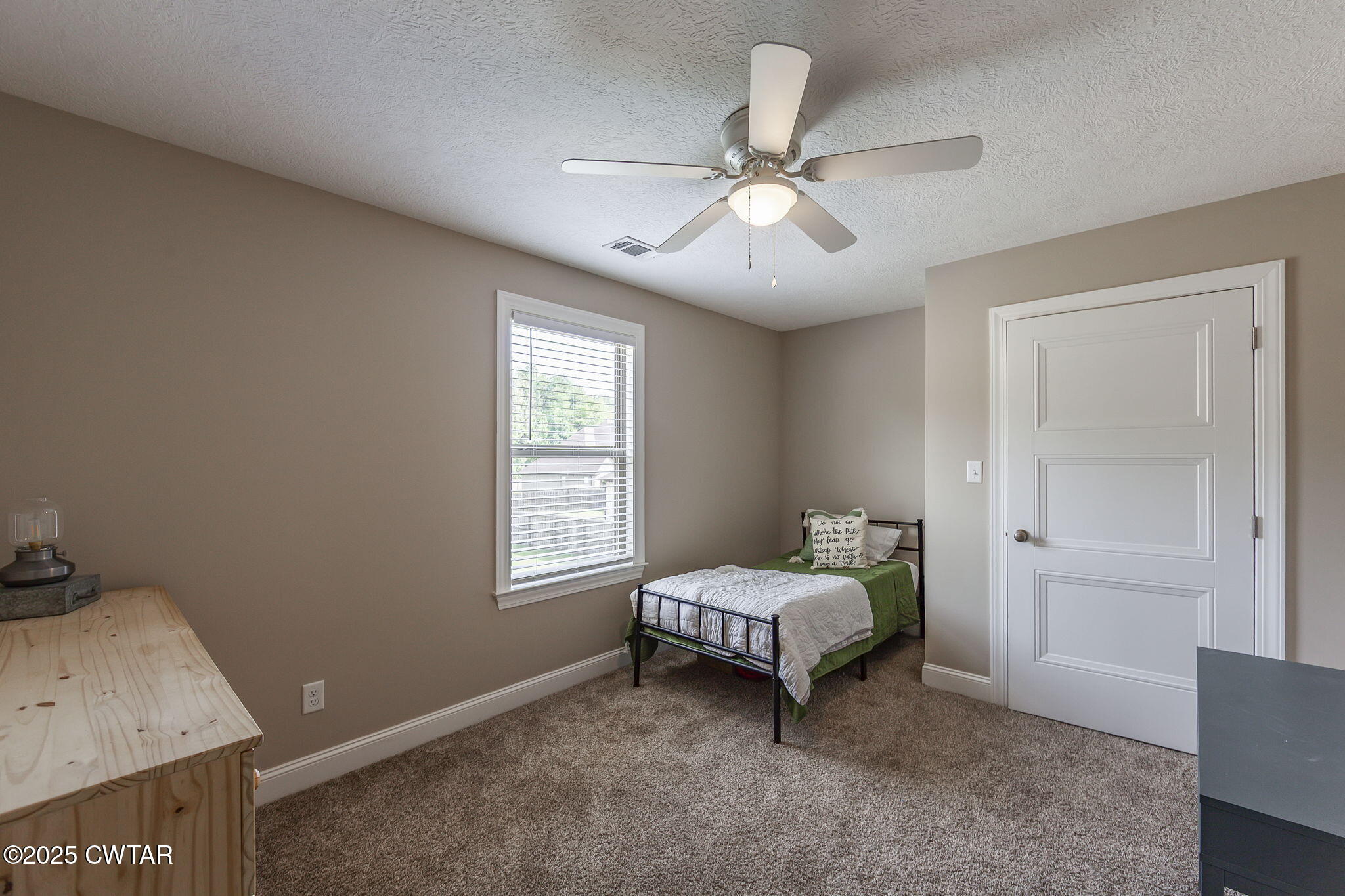105 Fawn Ridge Lane Medina, TN 38355 - Photo 25 of 40 a spacious bedroom with a bed and window