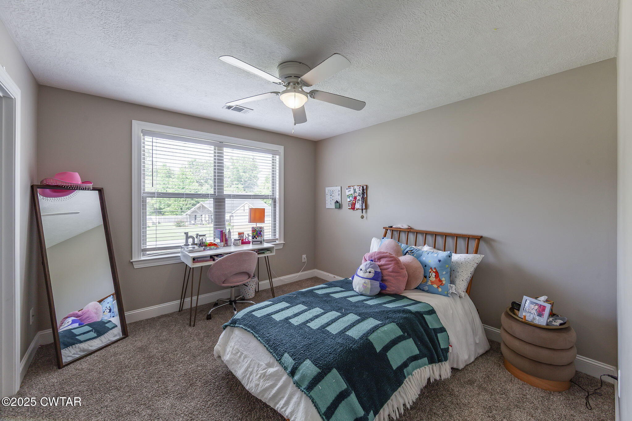 105 Fawn Ridge Lane Medina, TN 38355 - Photo 26 of 40 a bedroom with a bed and a window