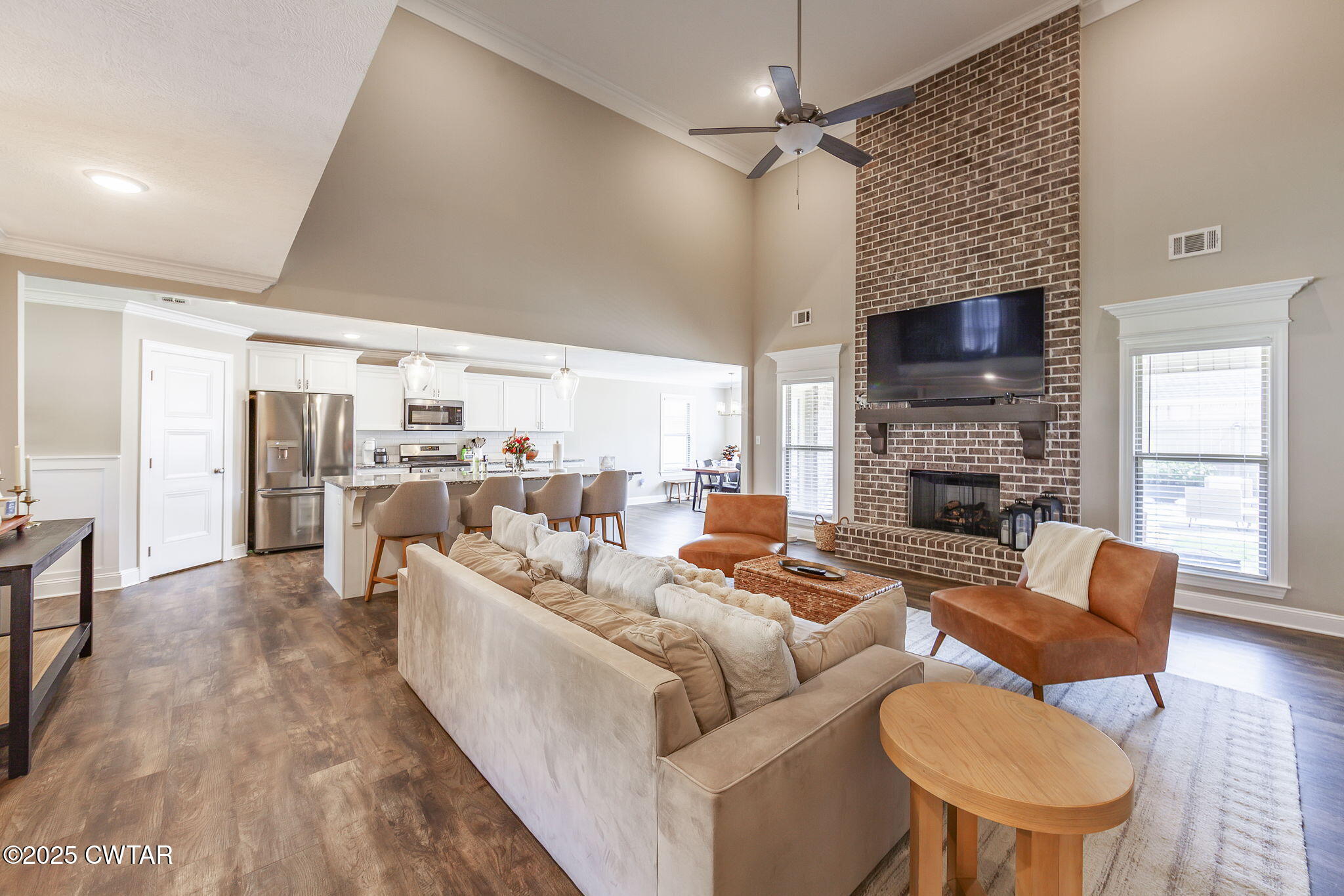 105 Fawn Ridge Lane Medina, TN 38355 - Photo 6 of 40 a living room with furniture fireplace and a flat screen tv