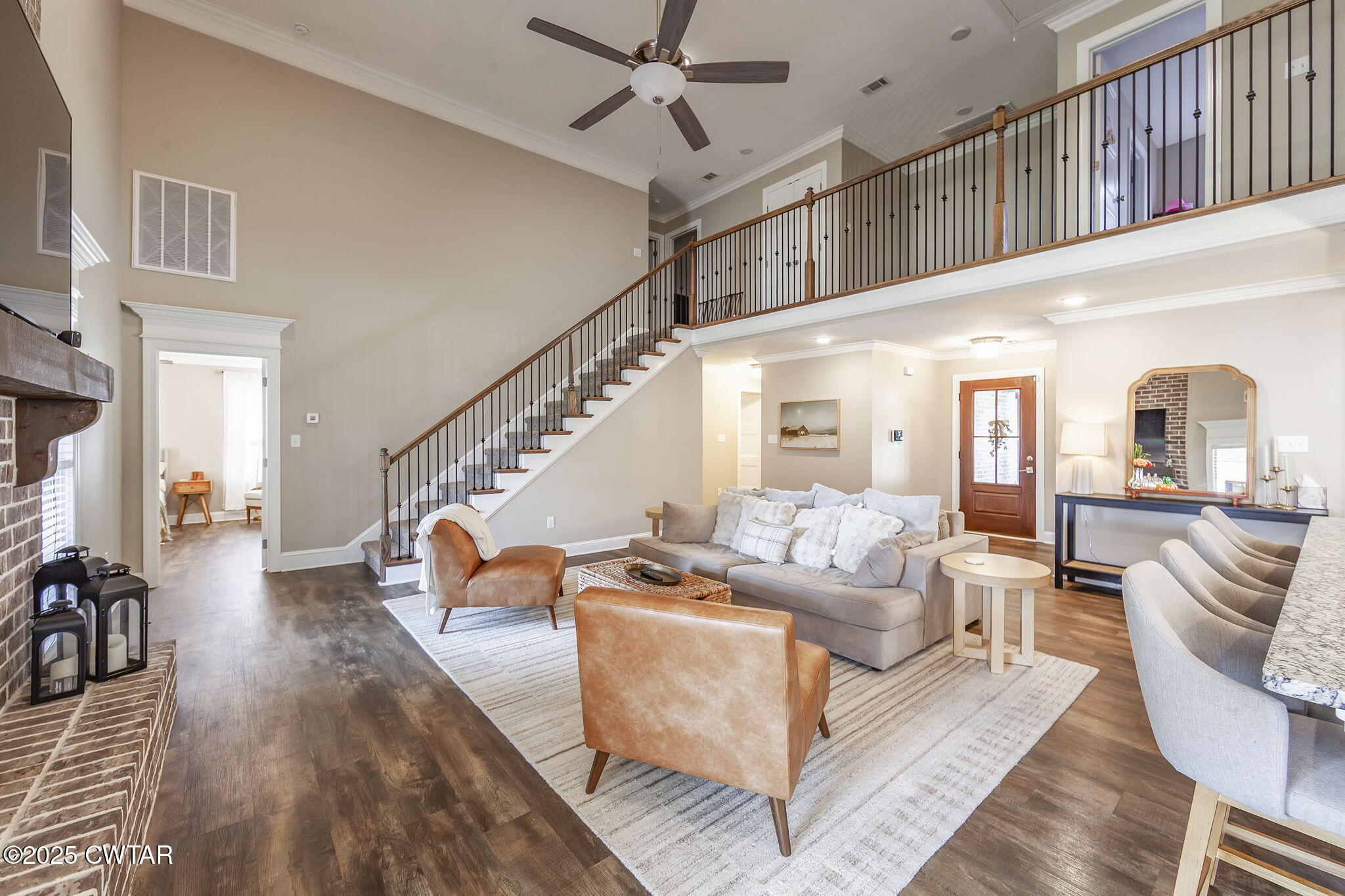 105 Fawn Ridge Lane Medina, TN 38355 - Photo 8 of 40 a living room with furniture and a chandelier