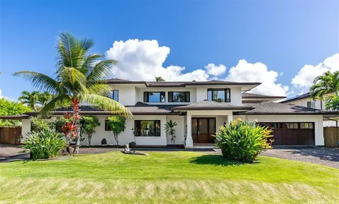 a view of a house with a swimming pool