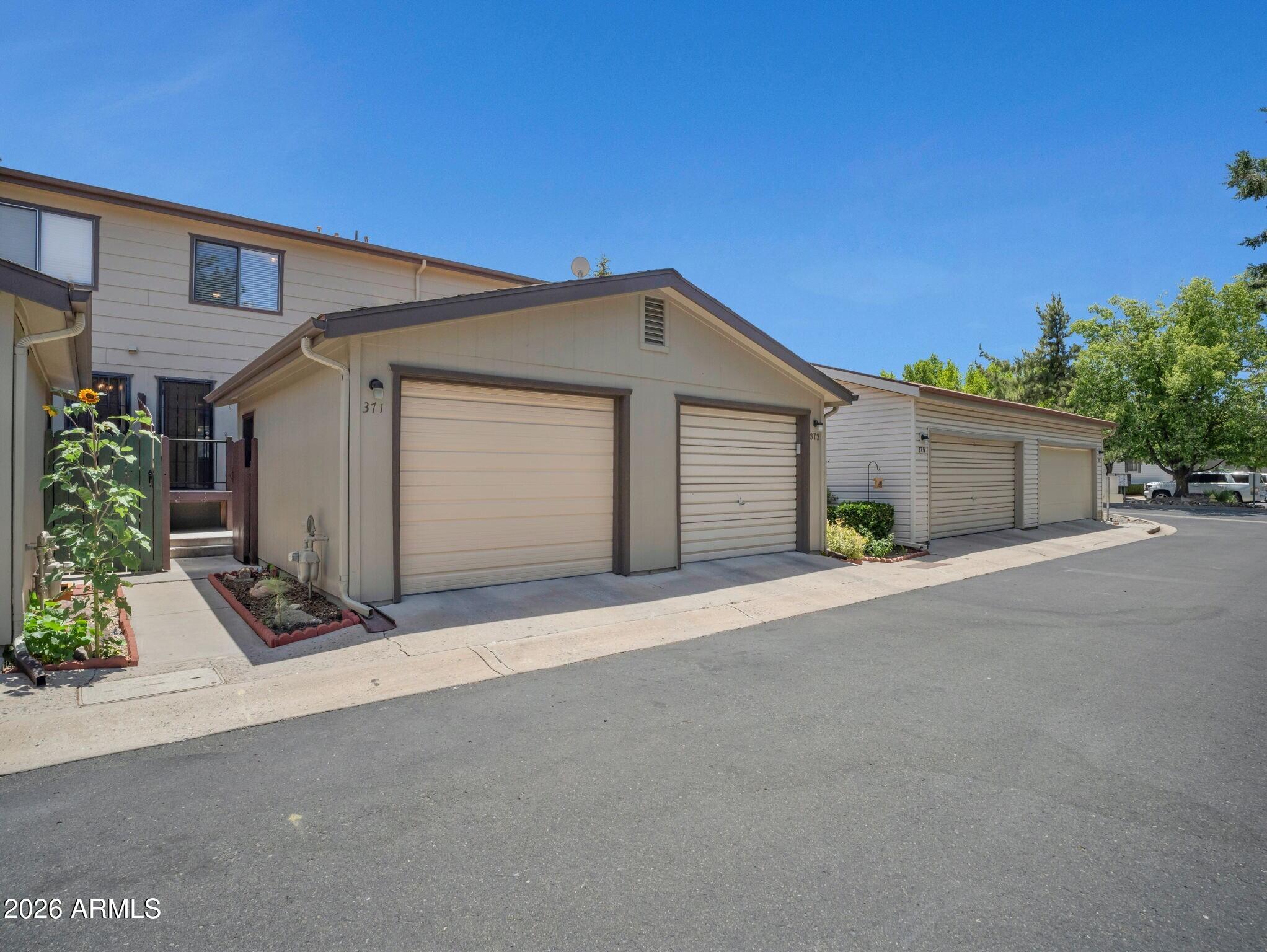 371 Rim Rock Circle, Unit 2 Prescott, AZ 86303 - Photo 1 of 36 002_Rim Rock Circle Garage Entrance