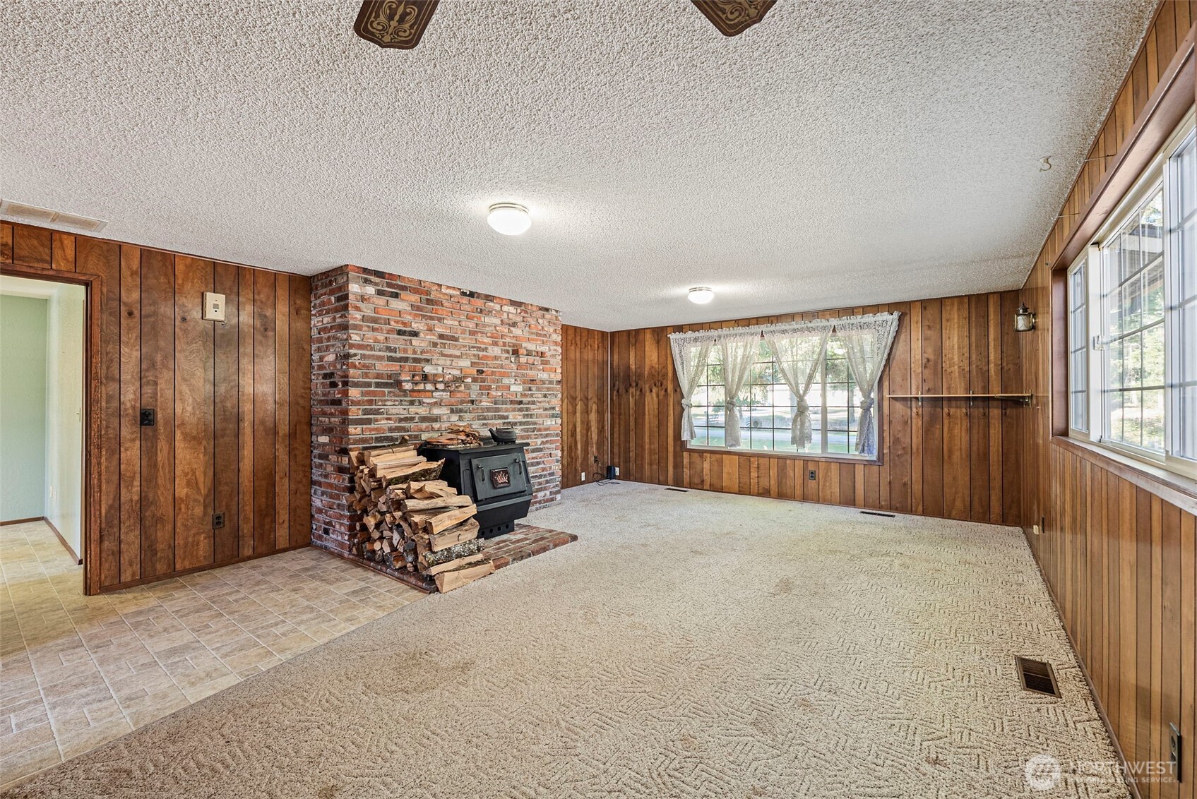 8112 266th Street East Graham, WA 98338 - Photo 12 of 40 an empty room with windows