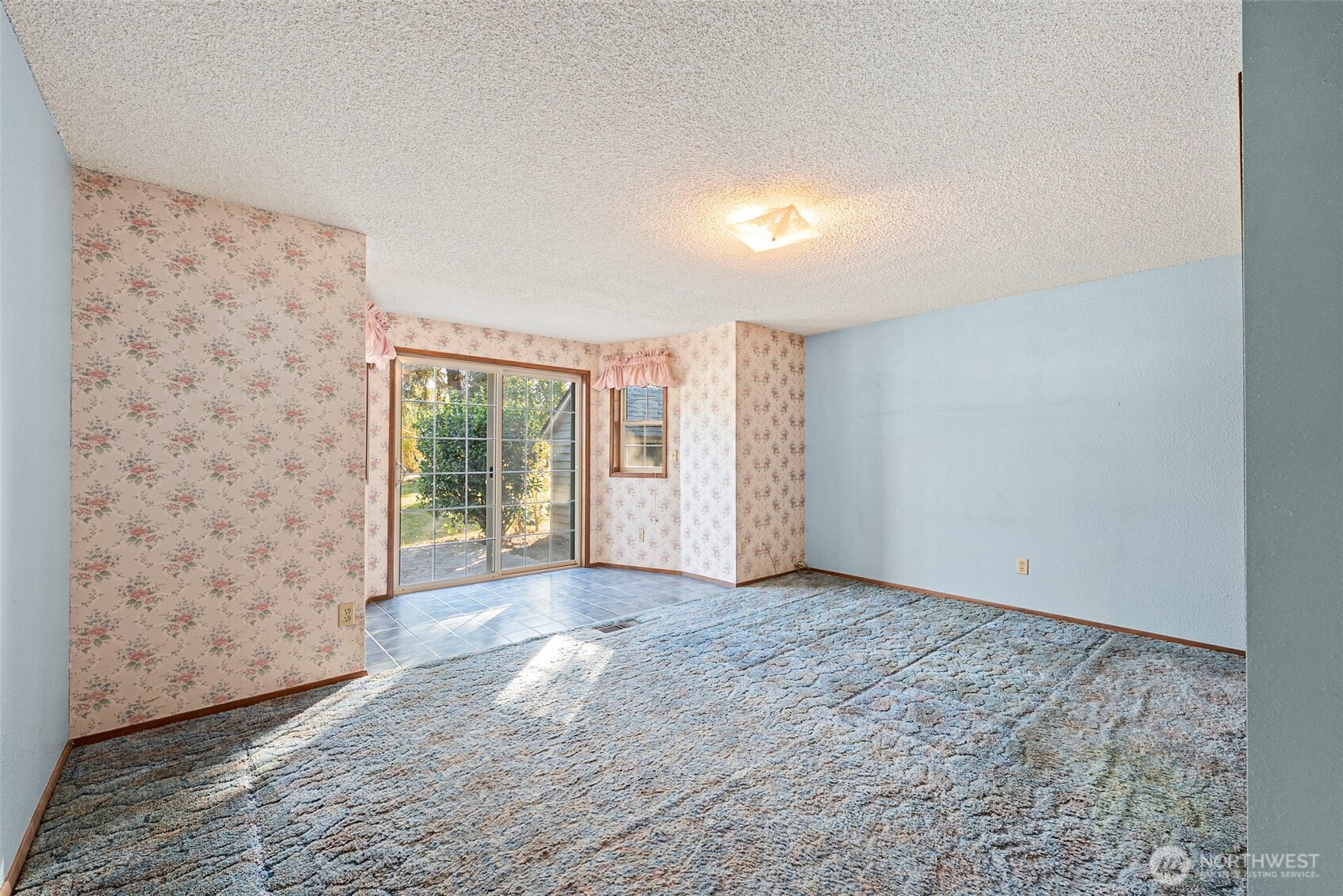 8112 266th Street East Graham, WA 98338 - Photo 20 of 40 a view of an empty room and window