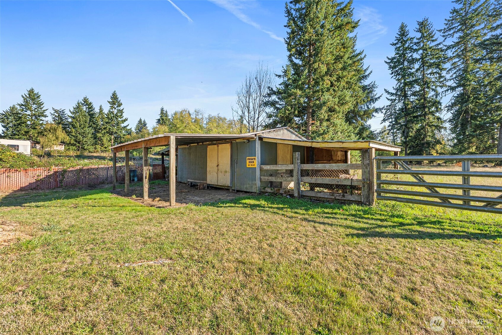 8112 266th Street East Graham, WA 98338 - Photo 31 of 40 a view of house with outdoor space and seating area