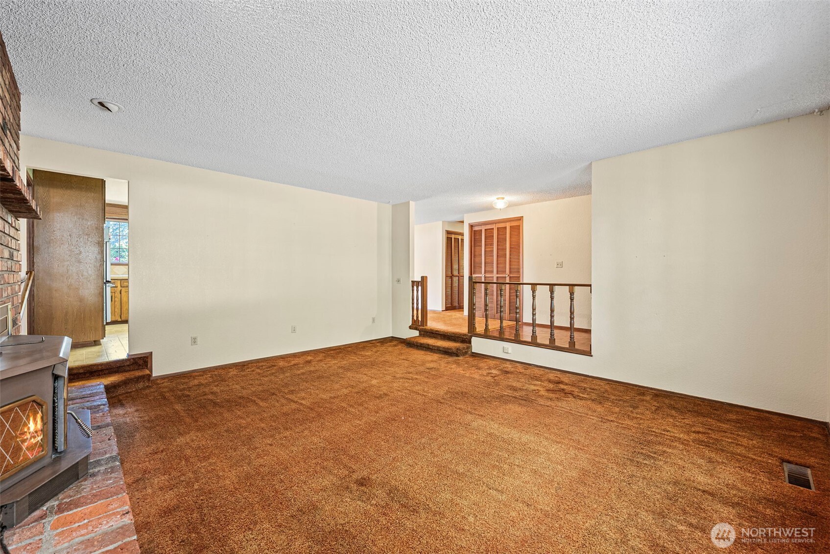 8112 266th Street East Graham, WA 98338 - Photo 4 of 40 a view of an empty room with a window