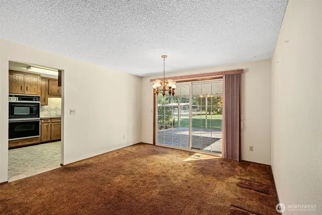 a view of a room with a chandelier