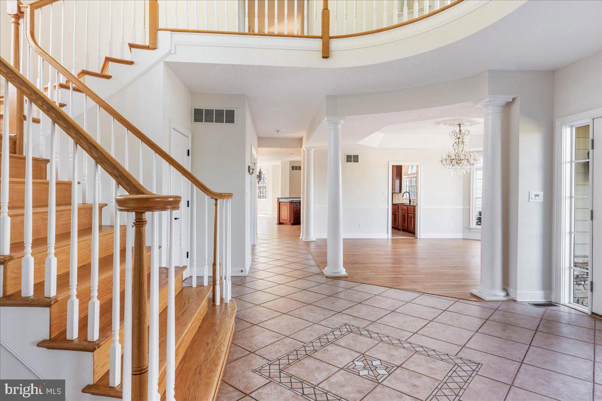 18 Todd Ridge Road Titusville, NJ 08560 - Photo 13 of 54 a view of entryway with wooden floor and stairs