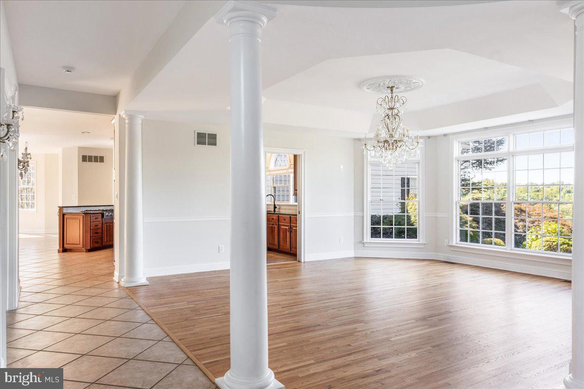 18 Todd Ridge Road Titusville, NJ 08560 - Photo 15 of 54 a view of a hallway with wooden floor and a chandelier