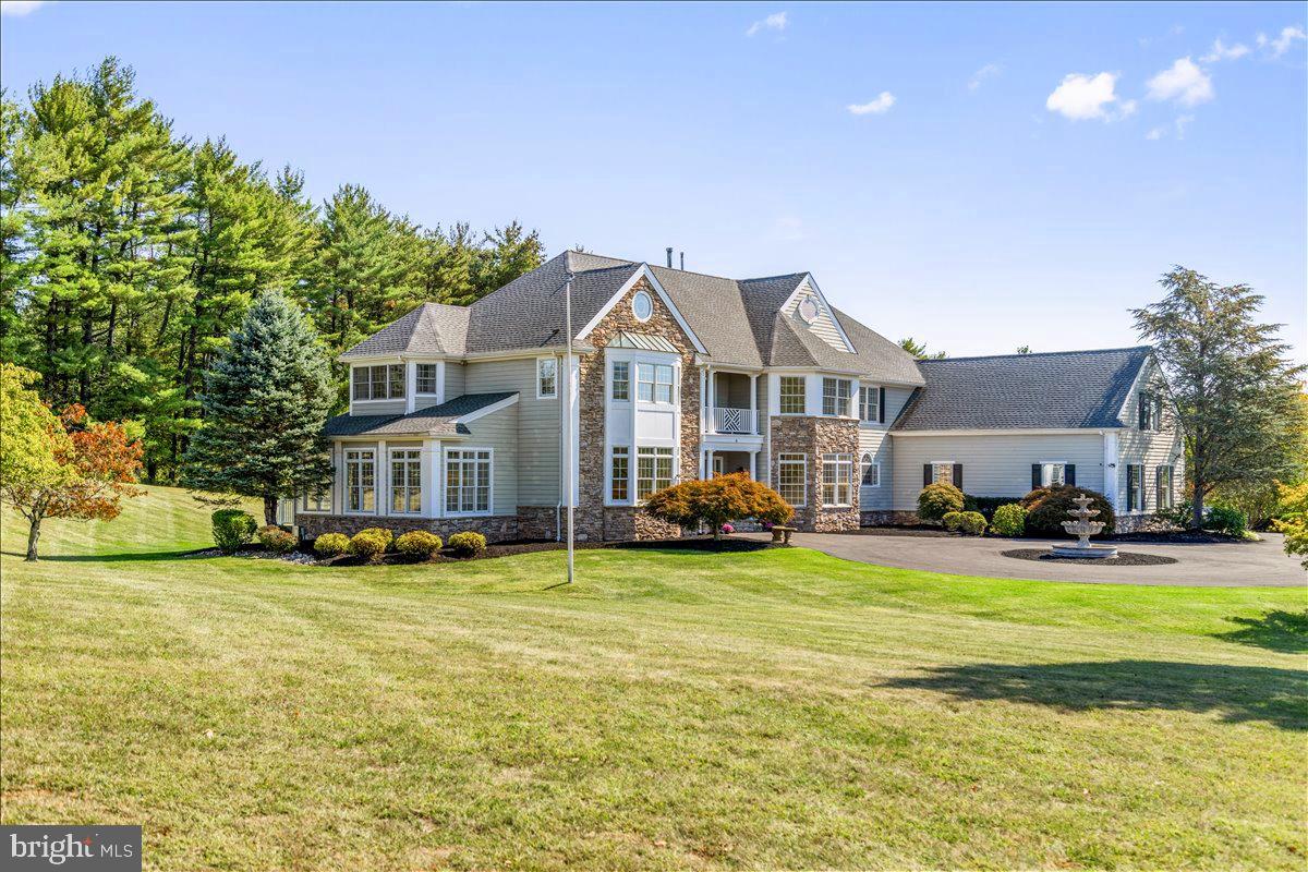18 Todd Ridge Road Titusville, NJ 08560 - Photo 2 of 54 a view of a house with a big yard and large trees