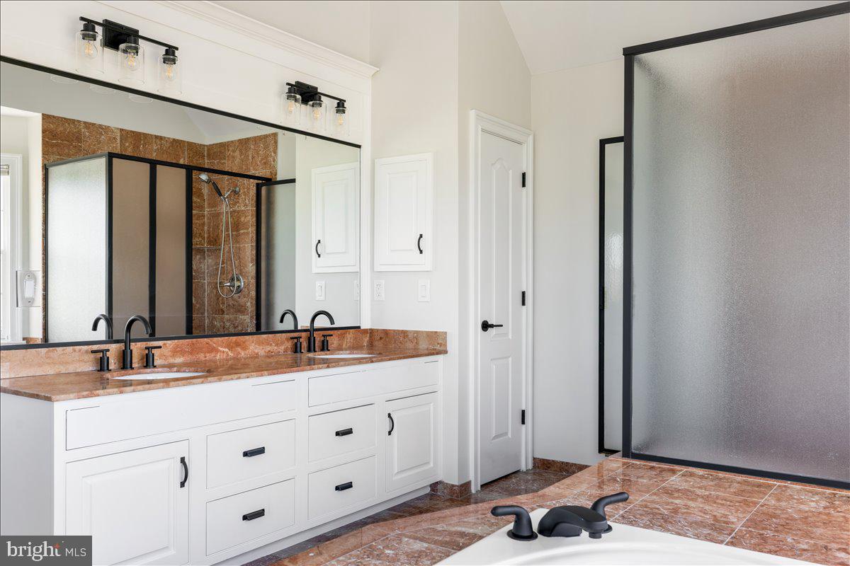 18 Todd Ridge Road Titusville, NJ 08560 - Photo 35 of 54 a bathroom with a granite countertop double vanity sink a mirror and a