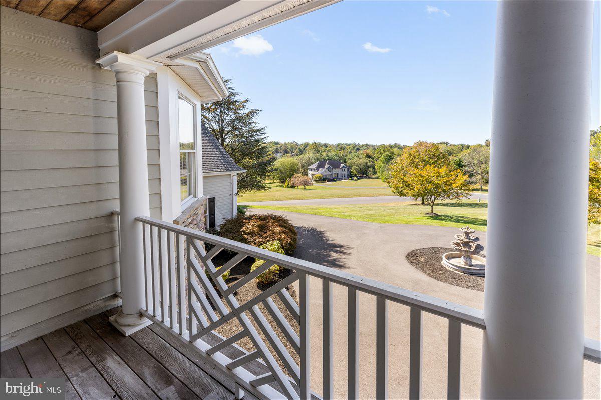 18 Todd Ridge Road Titusville, NJ 08560 - Photo 50 of 54 a view of a balcony with wooden floor next to a yard