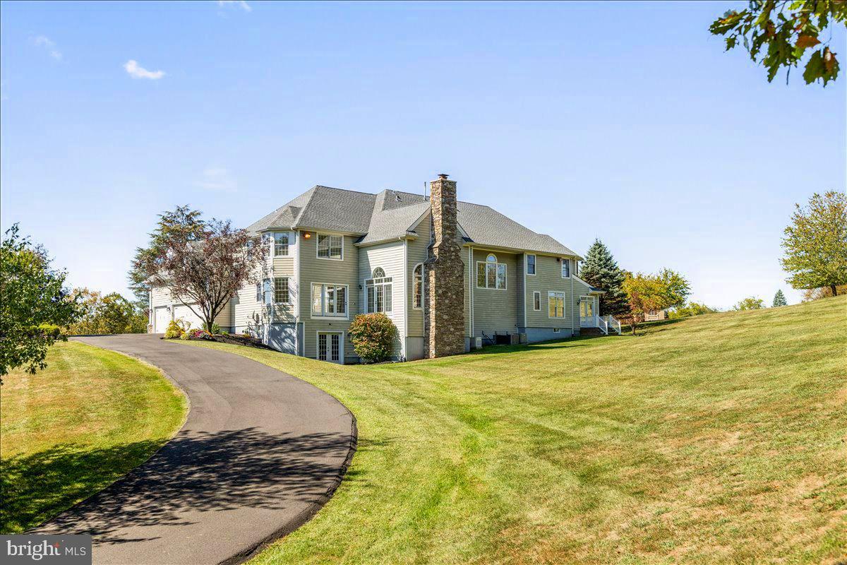 18 Todd Ridge Road Titusville, NJ 08560 - Photo 53 of 54 a front view of a house with a yard