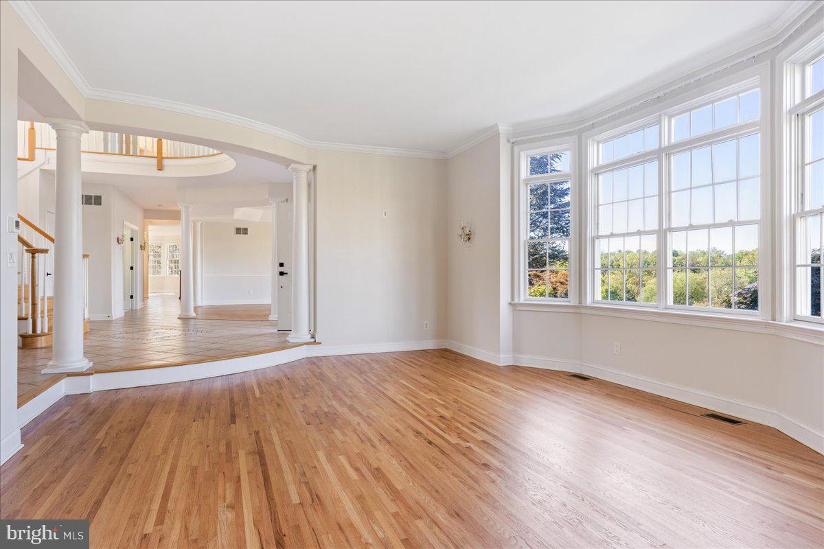 18 Todd Ridge Road Titusville, NJ 08560 - Photo 6 of 54 a view of an empty room with wooden floor and a window