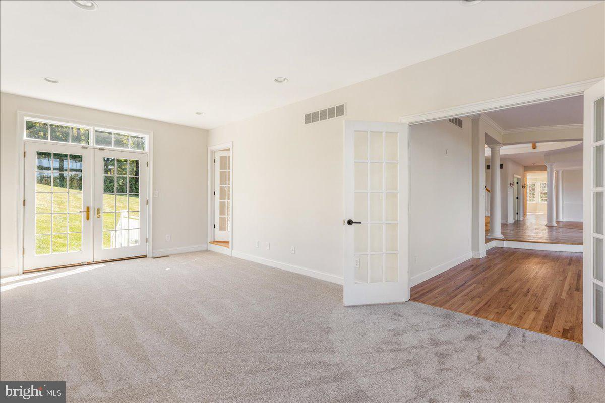 18 Todd Ridge Road Titusville, NJ 08560 - Photo 8 of 54 a view of an empty room with wooden floor and a window