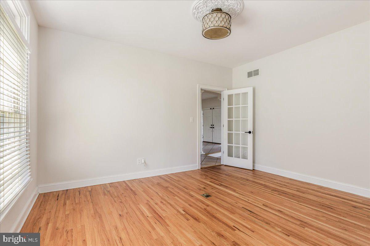 18 Todd Ridge Road Titusville, NJ 08560 - Photo 10 of 54 an empty room with wooden floor and windows