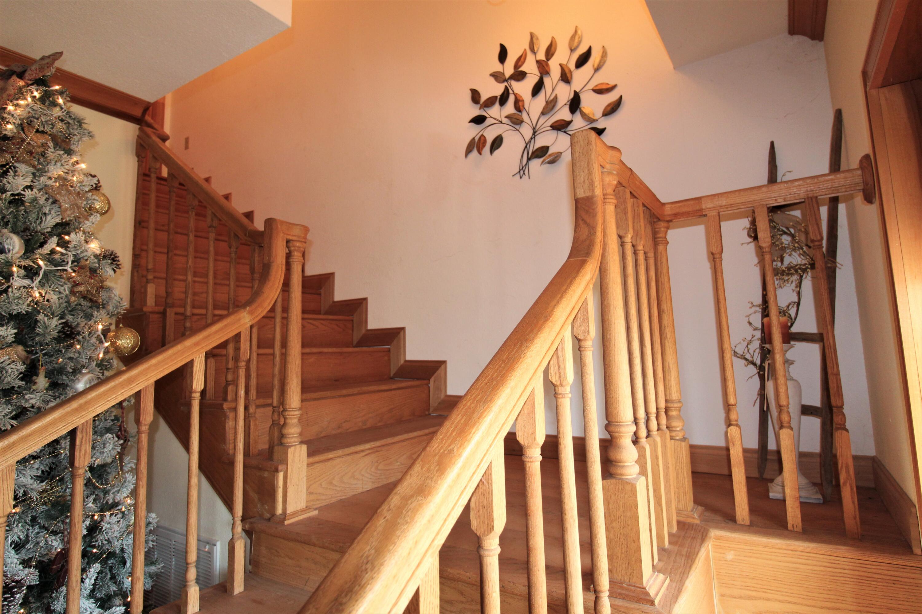 1245 North Shady Lane Road Campton, KY 41301 - Photo 55 of 96 057 main home - foyer and stairwell lead