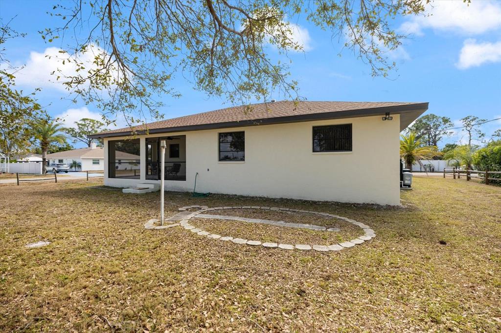 420 Duke Road Venice, FL 34293 - Photo 26 of 31 a view of a house with a backyard