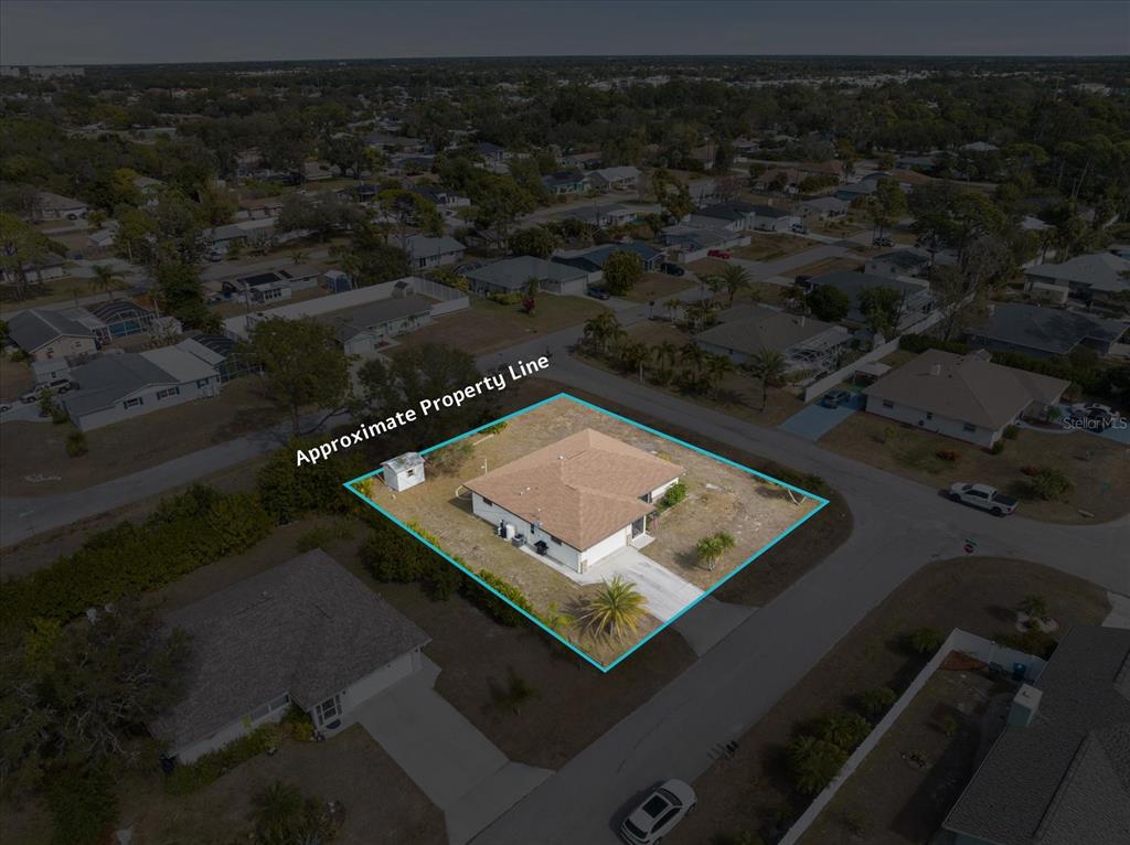 420 Duke Road Venice, FL 34293 - Photo 29 of 31 an aerial view of a house with a yard