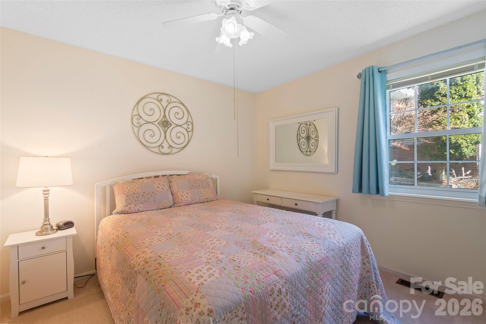 116 Lakeview Court Brevard, NC 28712 - Photo 19 of 43 a bedroom with a large bed and a window