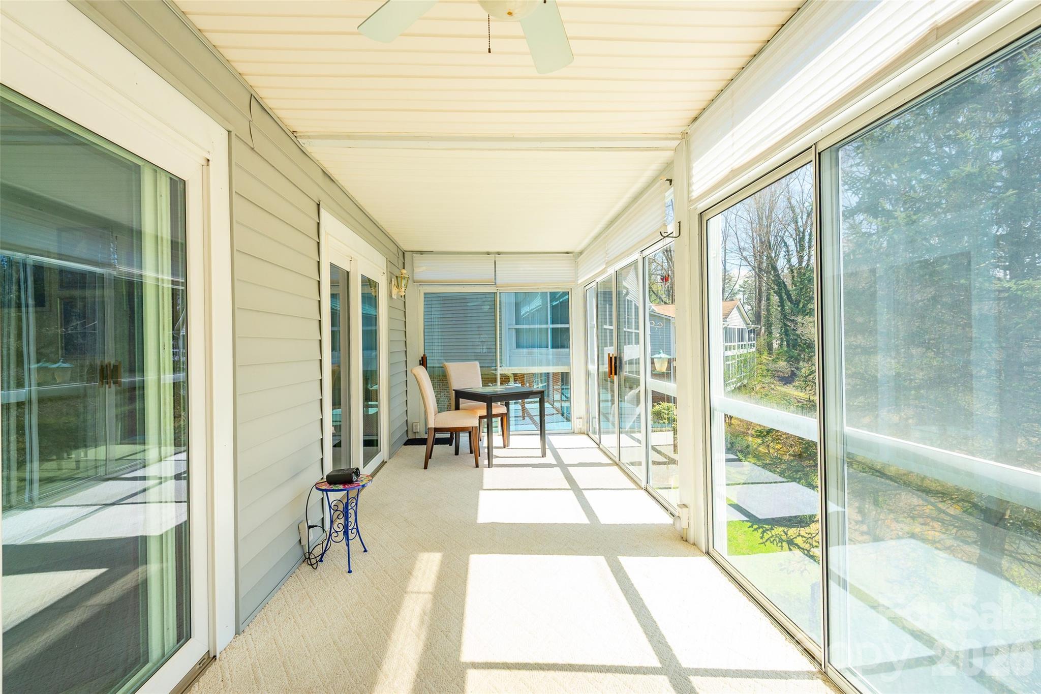 116 Lakeview Court Brevard, NC 28712 - Photo 22 of 43 a balcony with chairs and table