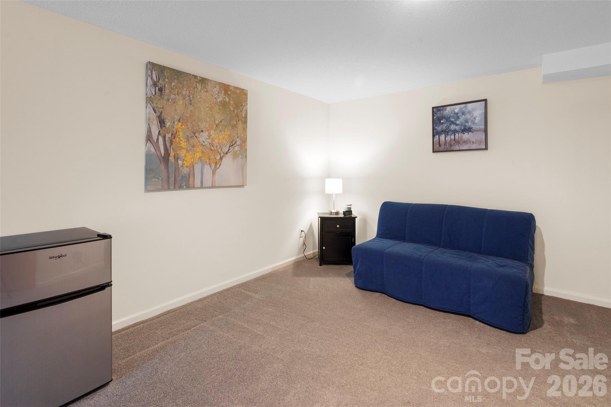 116 Lakeview Court Brevard, NC 28712 - Photo 28 of 43 a living room with furniture and a couch