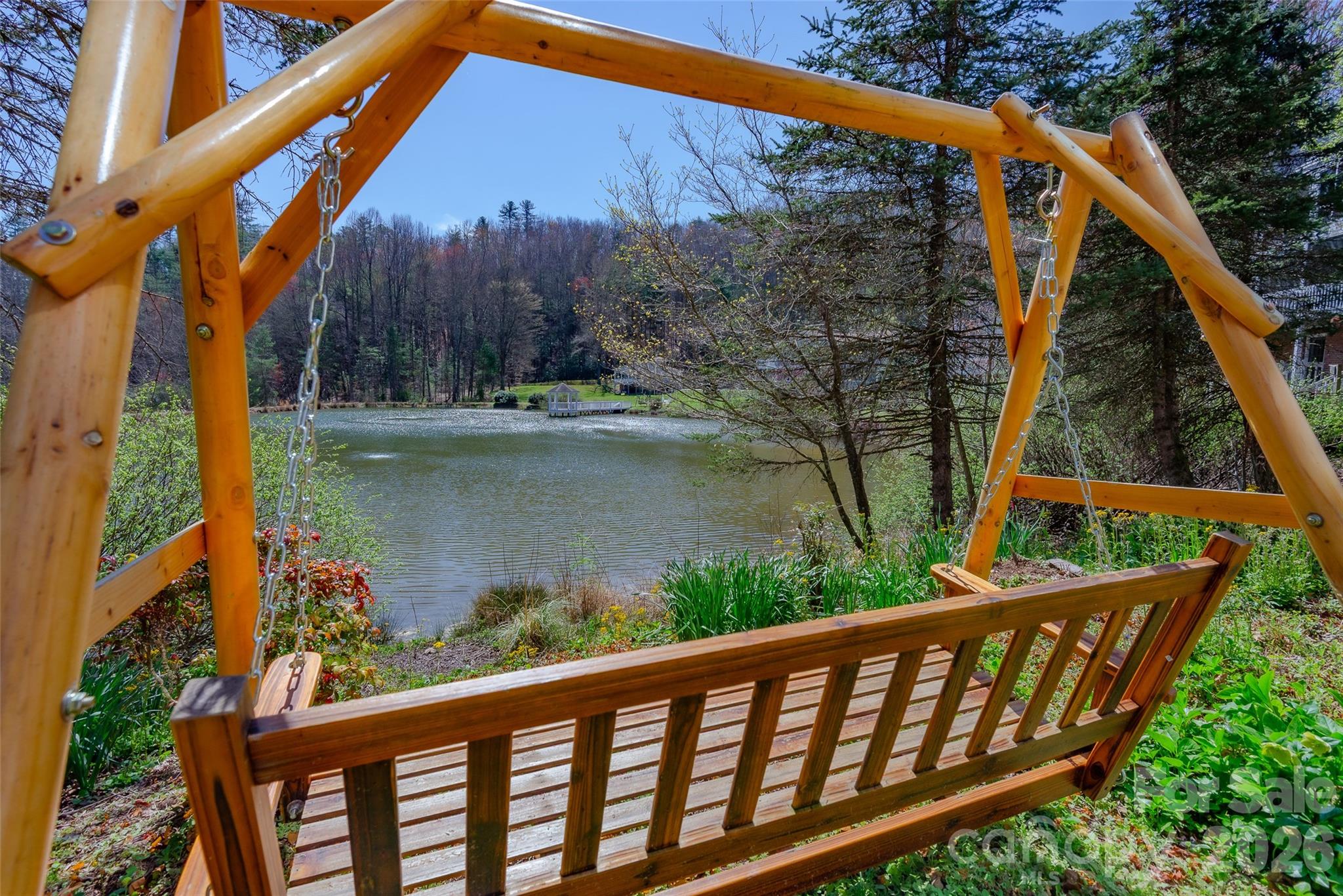 116 Lakeview Court Brevard, NC 28712 - Photo 35 of 43 a view of a wooden deck with a lake
