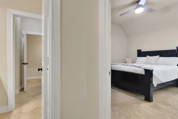 a view of a bedroom from hallway