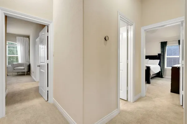 a living room with furniture and a gate