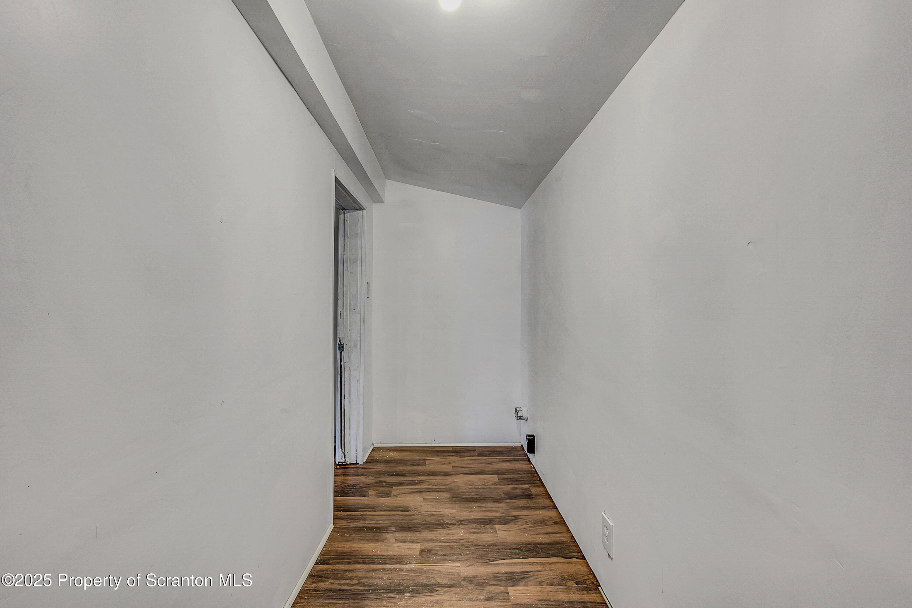 2528 Boulevard Avenue, Unit 2 Scranton, PA 18509 - Photo 17 of 18 a view of a hallway with wooden floor and staircase