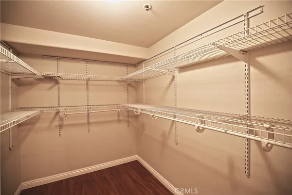 a view of a room with racks on the wall