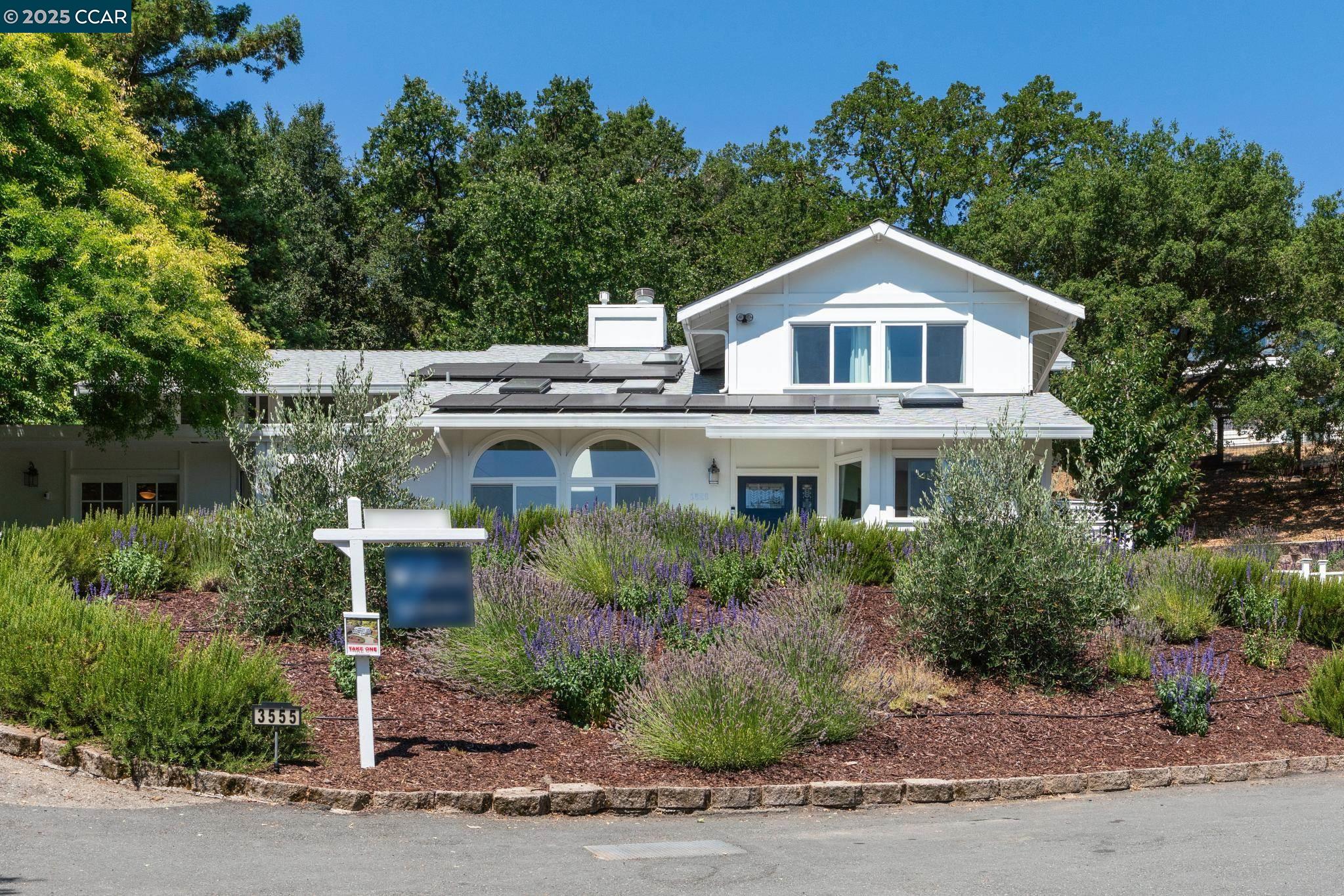 3555 Old Mountain View Drive Lafayette, CA 94549 - Photo 2 of 41 a house view with a garden