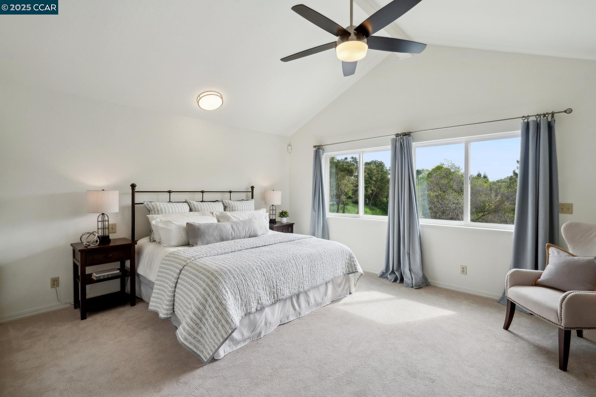 3555 Old Mountain View Drive Lafayette, CA 94549 - Photo 21 of 41 a bedroom with a bed and a large window