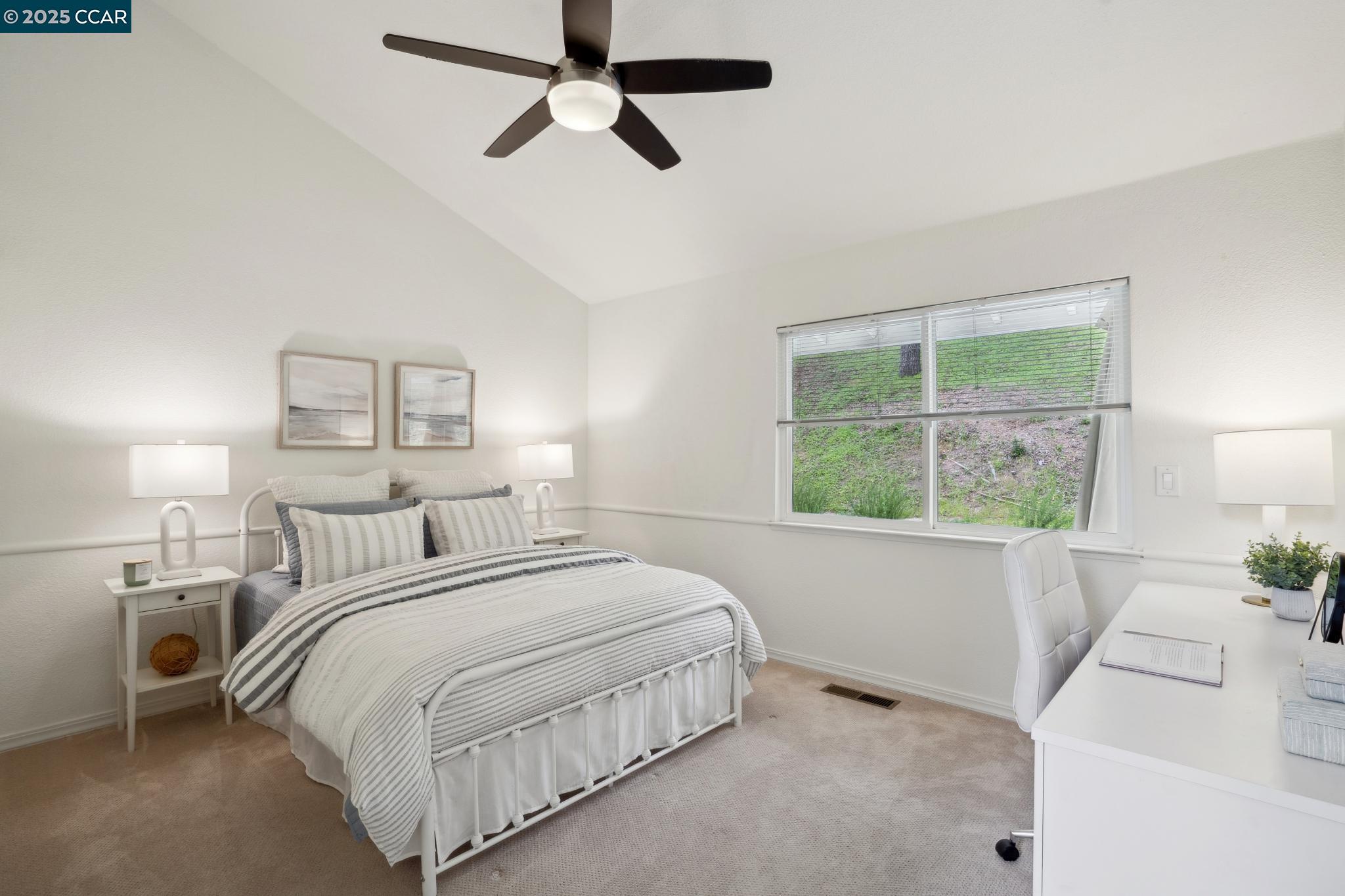 3555 Old Mountain View Drive Lafayette, CA 94549 - Photo 24 of 41 a bedroom with a bed a window and painting on the wall