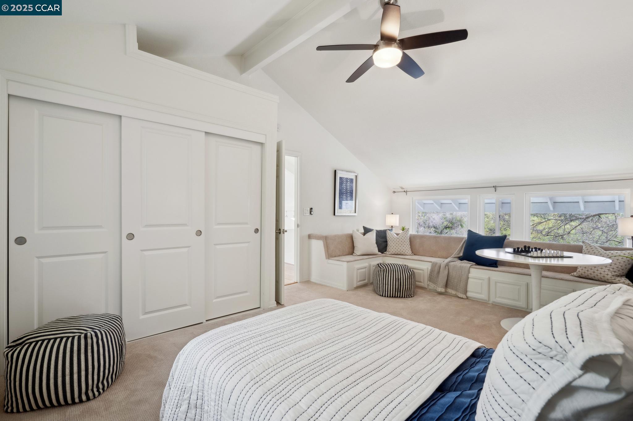 3555 Old Mountain View Drive Lafayette, CA 94549 - Photo 28 of 41 a bedroom with a bed and wooden floor