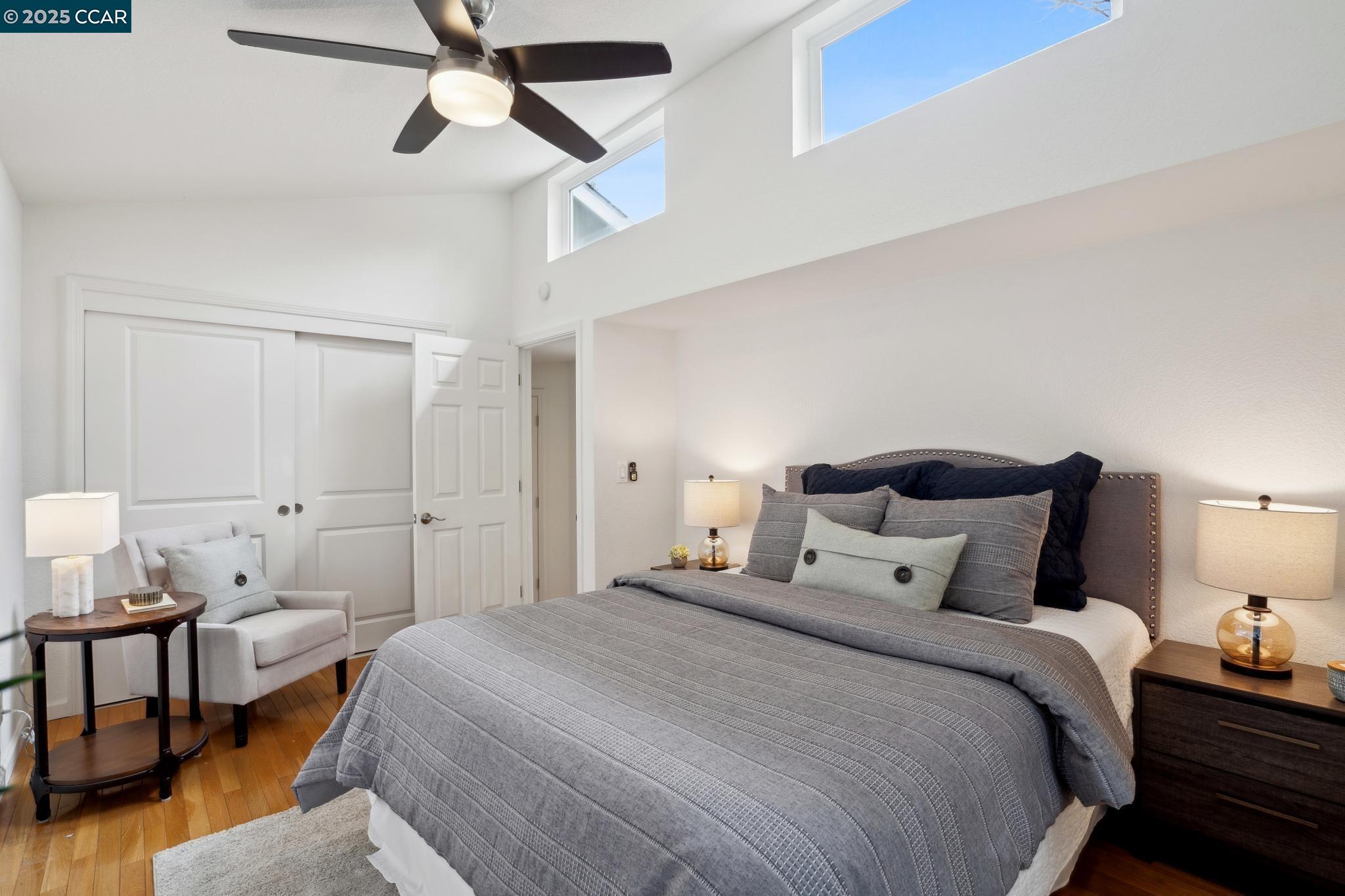 3555 Old Mountain View Drive Lafayette, CA 94549 - Photo 29 of 41 a bedroom with a bed and wooden floor