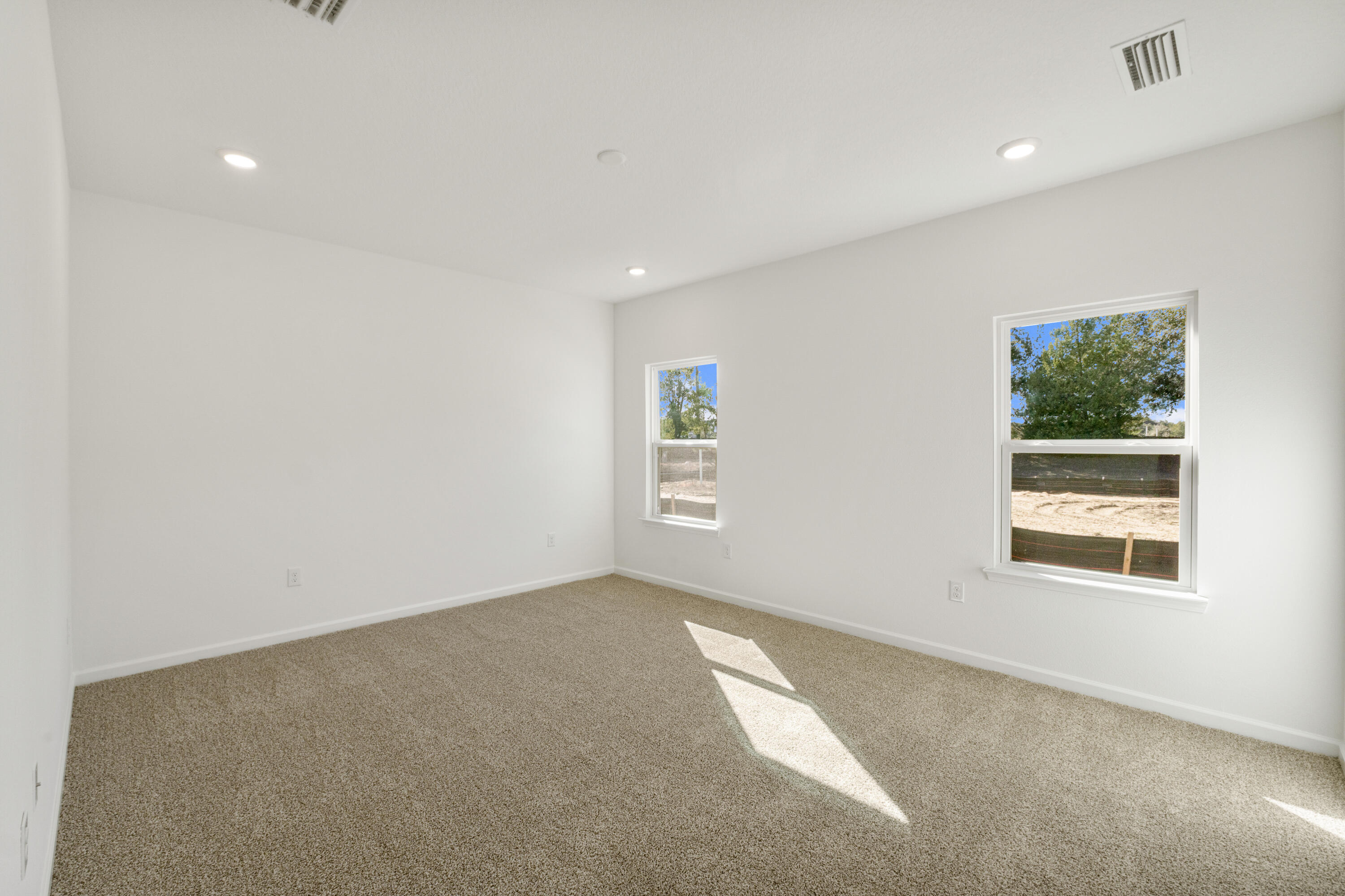 123 Staggerbush Street Freeport, FL 32439 - Photo 16 of 24 an empty room with windows
