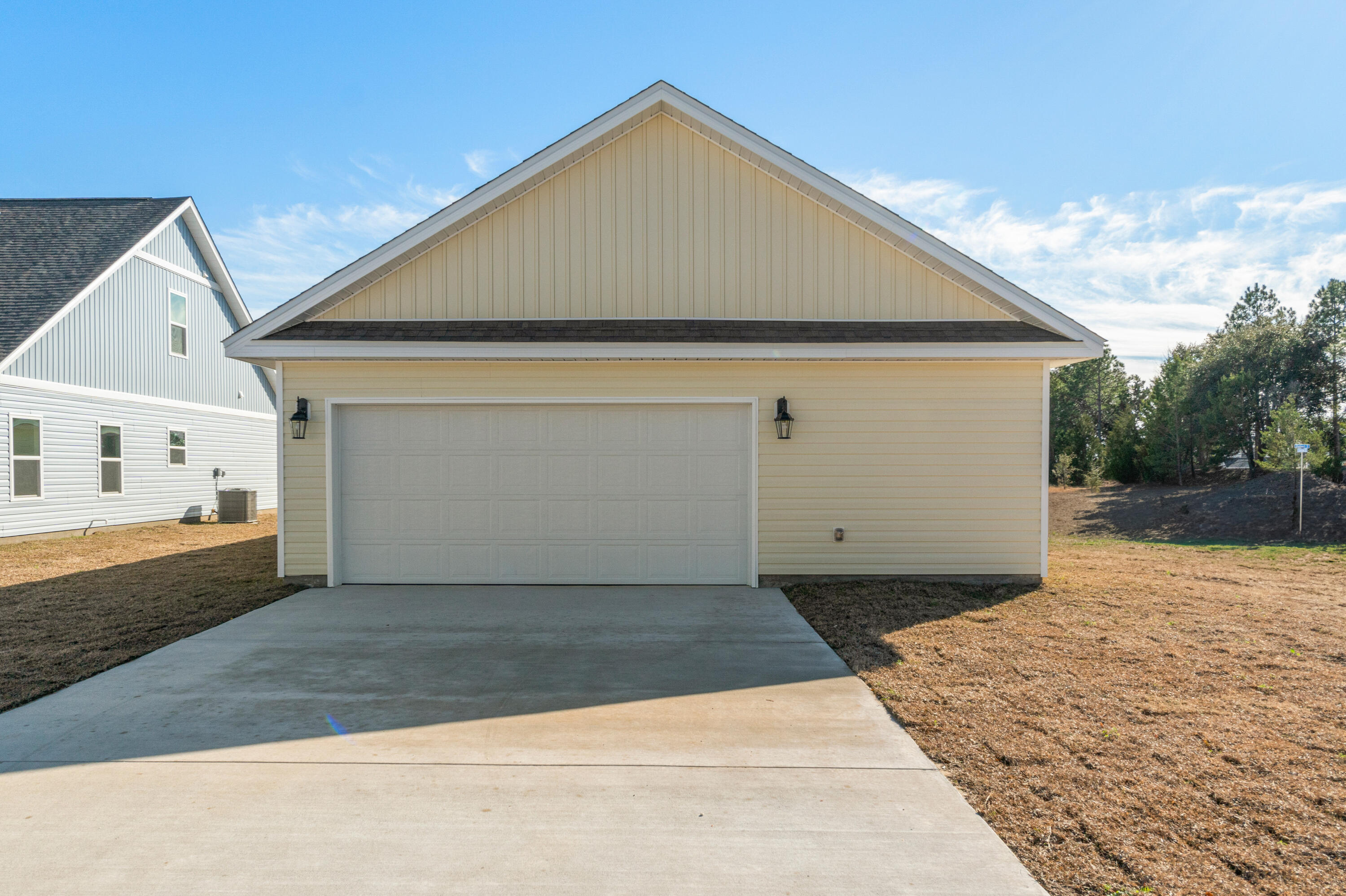 123 Staggerbush Street Freeport, FL 32439 - Photo 22 of 24 a front view of house with yard