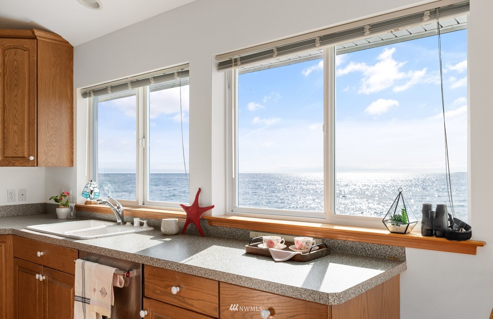 2585 West Beach Road Oak Harbor, WA 98277 - Photo 18 of 38 a view of a sink and a granite counter top