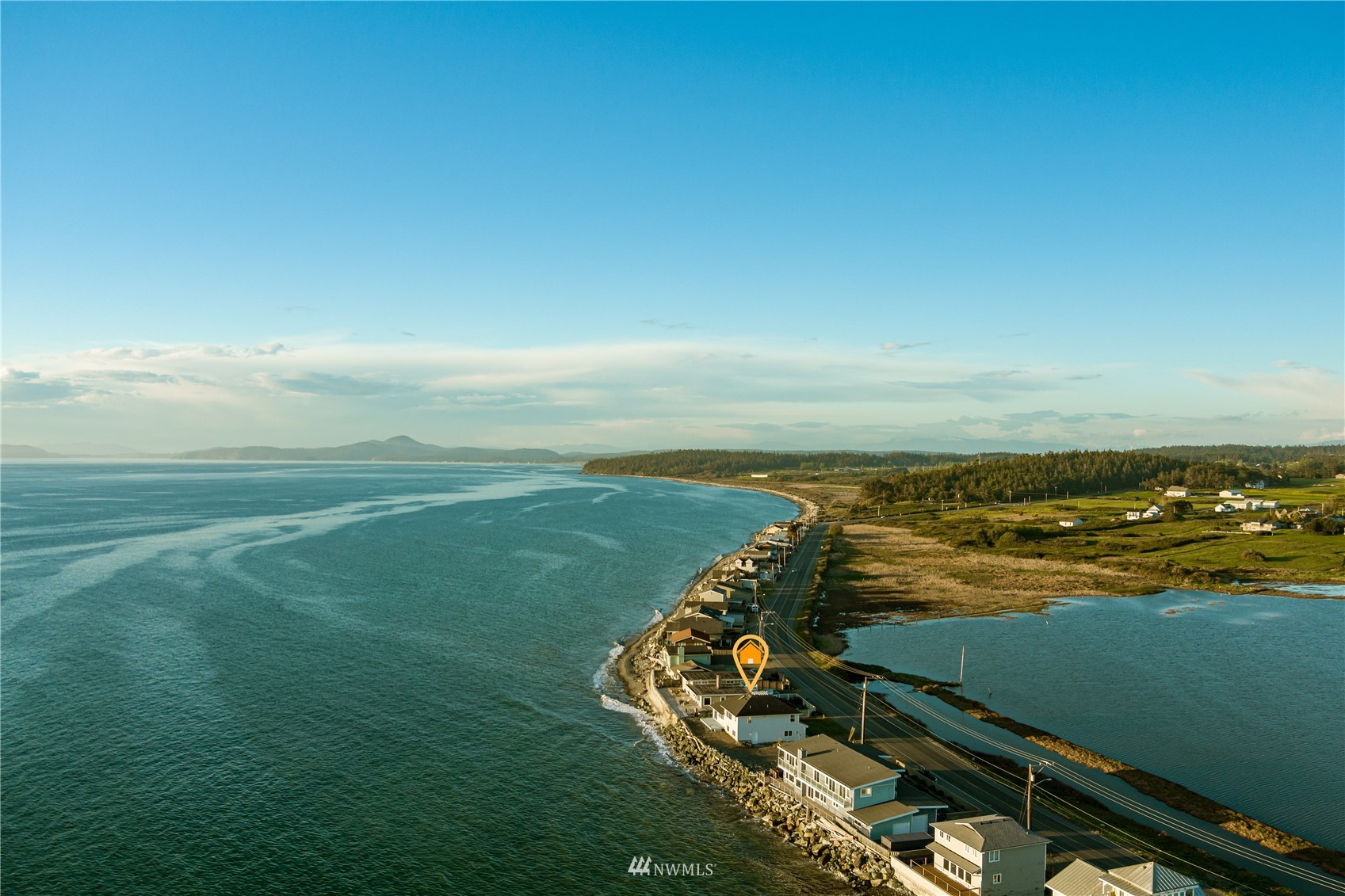 2585 West Beach Road Oak Harbor, WA 98277 - Photo 34 of 38 a view of an ocean from a balcony
