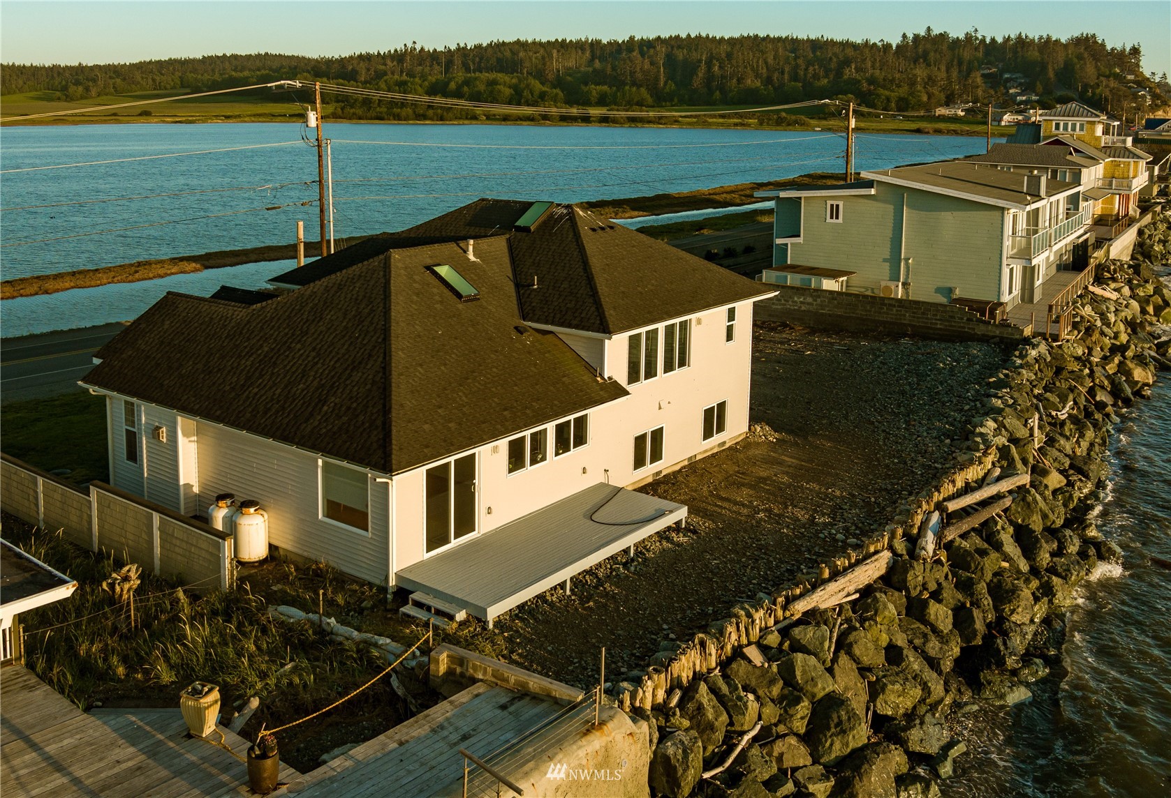 2585 West Beach Road Oak Harbor, WA 98277 - Photo 36 of 38 a view of a house with a lake view