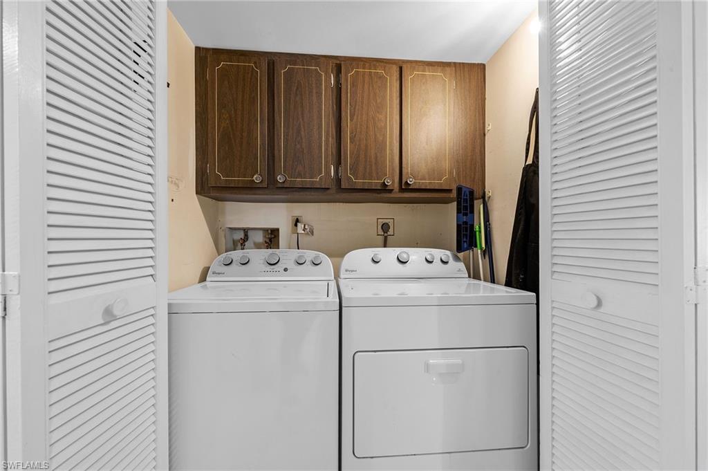 817 Teryl Road, Unit 1 Naples, FL 34112 - Photo 22 of 47 a utility room with dryer and washer