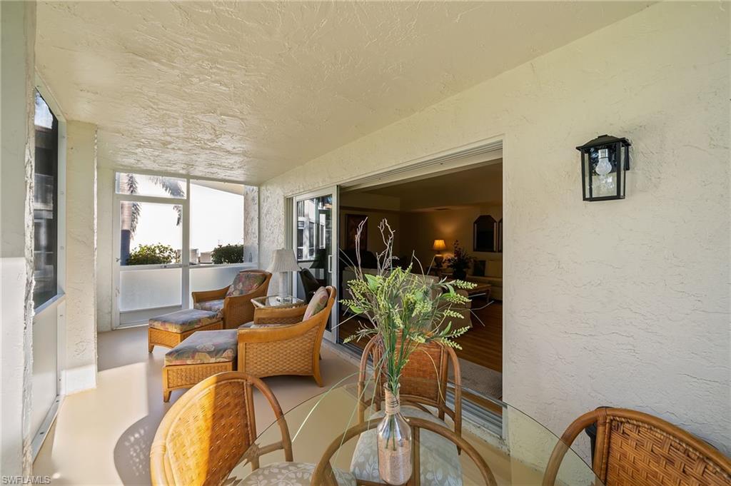 817 Teryl Road, Unit 1 Naples, FL 34112 - Photo 29 of 47 a living room with furniture and a potted plant