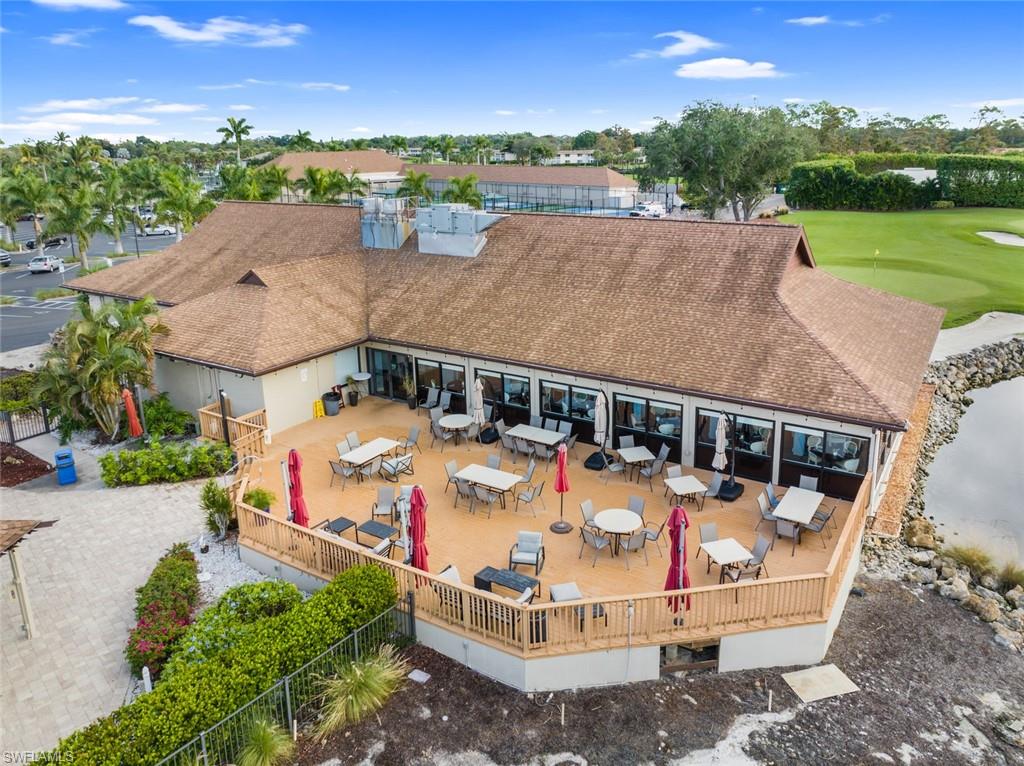 817 Teryl Road, Unit 1 Naples, FL 34112 - Photo 42 of 47 an aerial view of a house with a yard
