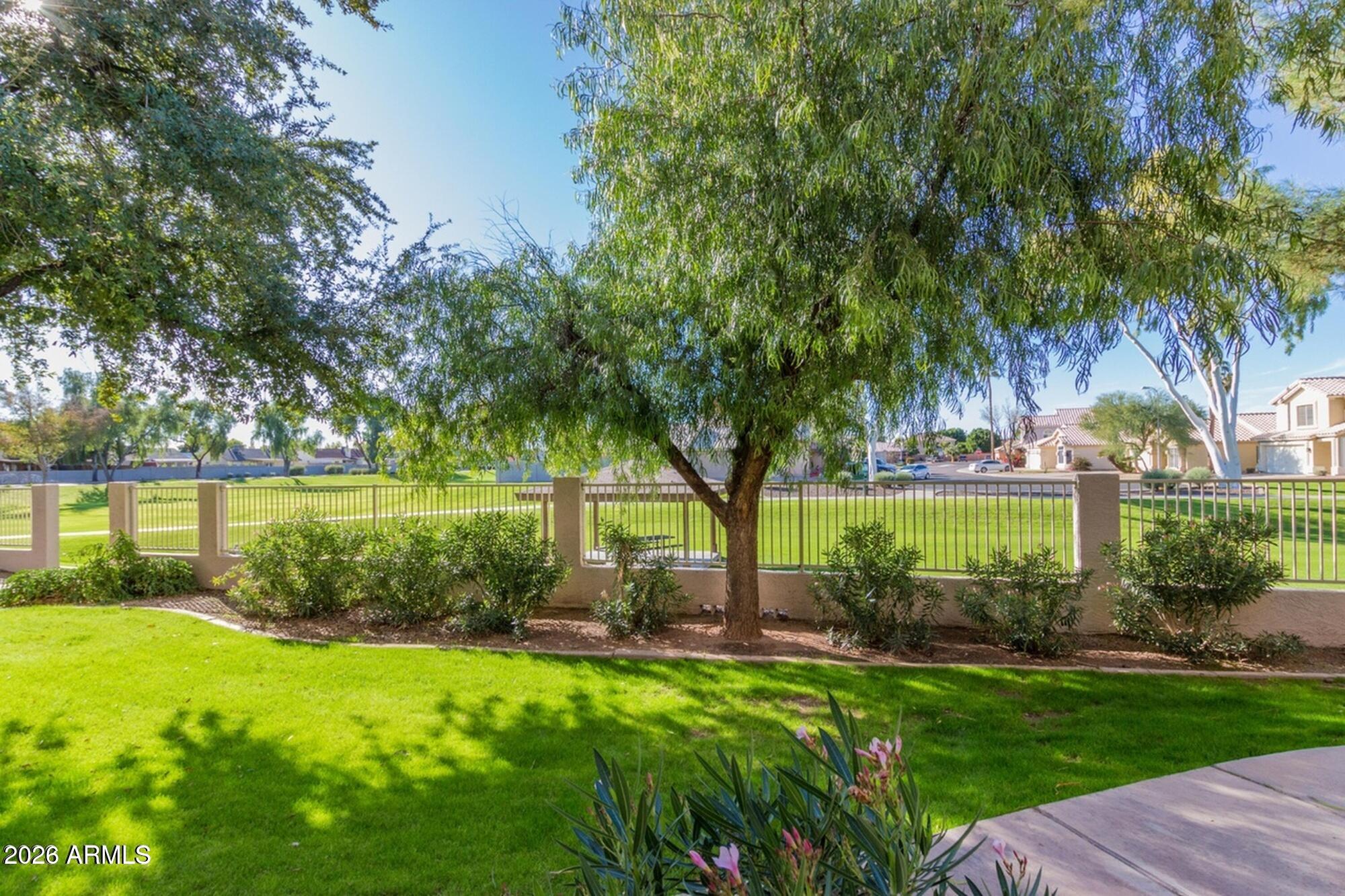 1295 North Ash Street, Unit 617 Gilbert, AZ 85233 - Photo 15 of 21 a view of a park with large trees