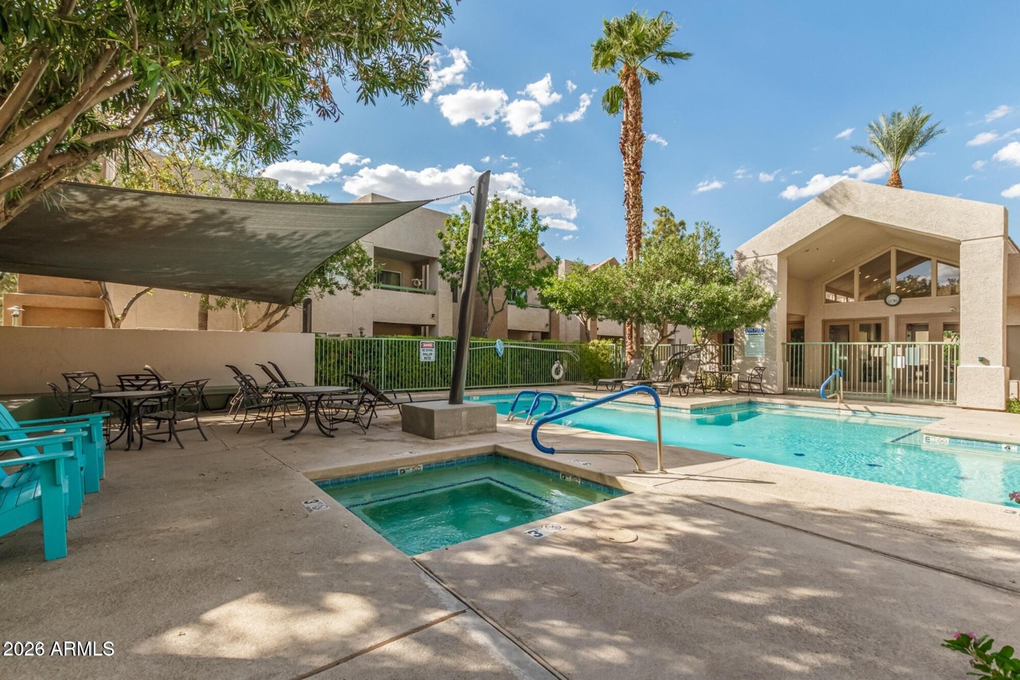 1295 North Ash Street, Unit 617 Gilbert, AZ 85233 - Photo 18 of 21 a view of a house with backyard and porch