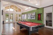 1295 North Ash Street, Unit 617 Gilbert, AZ 85233 - Photo 19 of 21 a room with pool table and windows