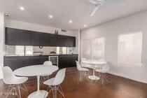 1295 North Ash Street, Unit 617 Gilbert, AZ 85233 - Photo 21 of 21 a living room with furniture and a large window